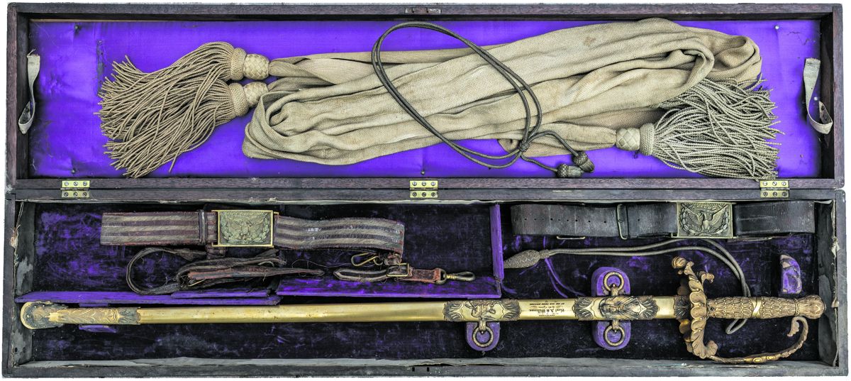 Original “royal purple” lined sword case displaying General William’s sword and accessories including regulation general’s buff sash and bullion embroidered hat cord.