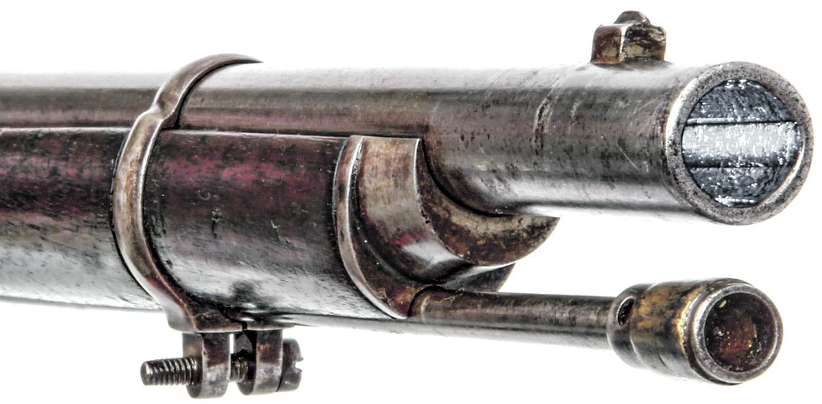 Muzzle area of a Spanish M1857/59 rifle showing the 3-groove rifling and the correct pattern brass banded ramrod.