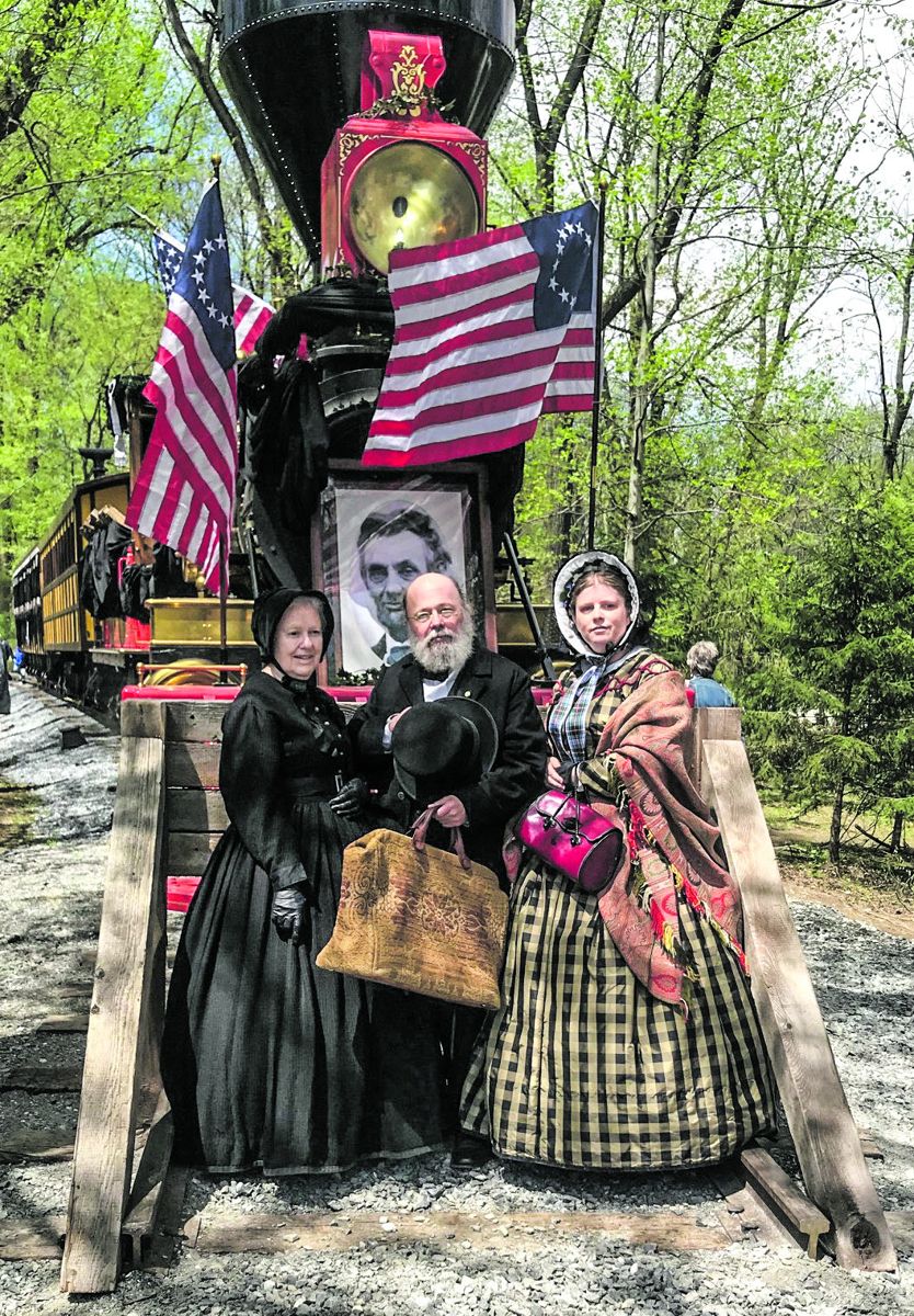 Faith and Mark Hintzen, and Sherri Groff, members of the Atlantic Guard Soldiers’ Aid Society, portrayed members of the Elizabethtown, Penn., community who came to pay their respects to their fallen President.