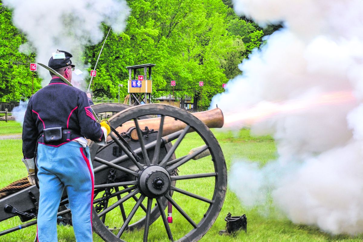 Members of the 118th Pennsylvania Volunteer Infantry and the 3rd U.S. Infantry fire a memorial salute for the late Howard (Ken) Kortman with Roger Hipple’s 12-pounder Napoleon that Kortman had crewed for many years with the 3rd U.S. (Hipple). (Tambi Dudley and Schuetzen Powder Energetics Inc.)
