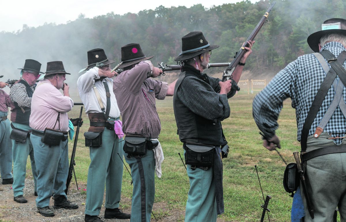 Safety is a priority in the N-SSA, and proper gun handling is a must when loading and firing these guns. Here, the Union Guards carefully load and fire away at the four-inch hanging tiles while overseen by a safety officer.