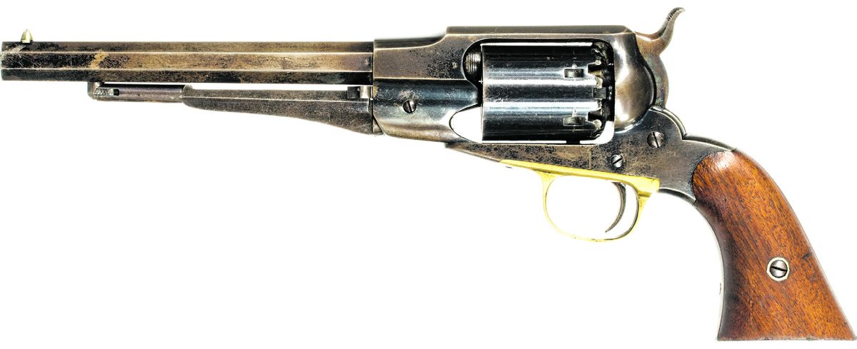 A later production Remington Elliott or “Old Model” 1861 Navy Revolver #18,298. Note the relief cut frame that exposes the barrel threads and the safety notches between the percussion cone recesses. Only the older Beals style high spur hammer is retained on this gun.