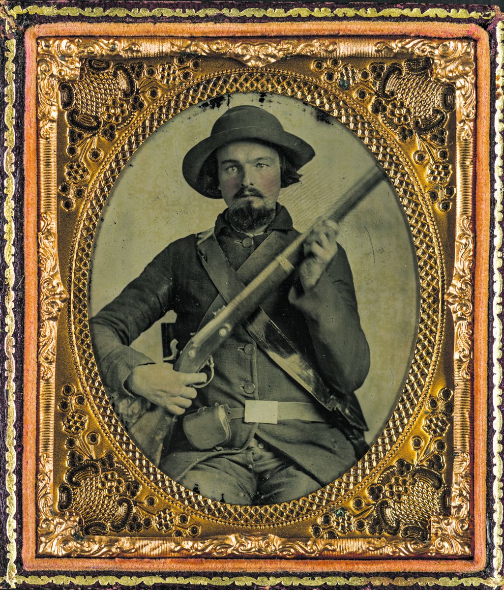 Private Elijah S. Leach of Co. B, 31st Virginia Infantry Regiment in uniform with musket, cap box, and haversack. (Library of Congress)