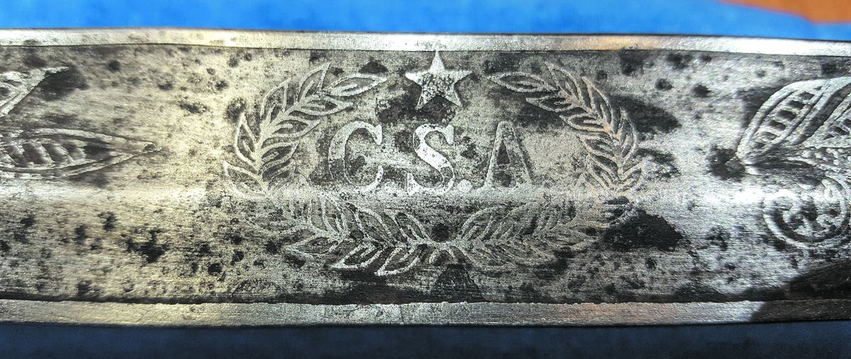 The etching pattern, above and below, is not close to original McElroy patterns. There are much better fakes out there that emulate several Confederate makers’ etching styles and have sold for
