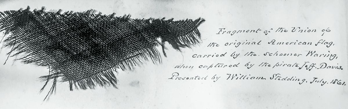 Fragment of flag that flew over S.J. Waring.