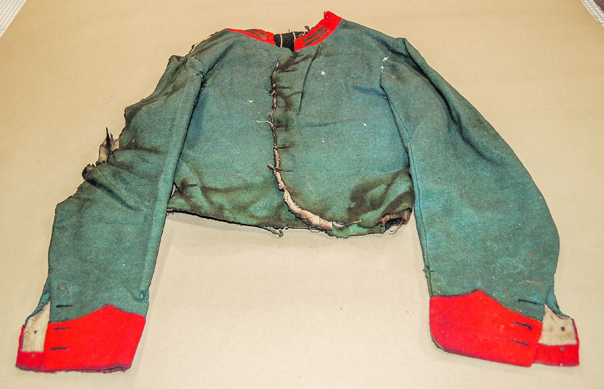 Coat, front, before treatment.