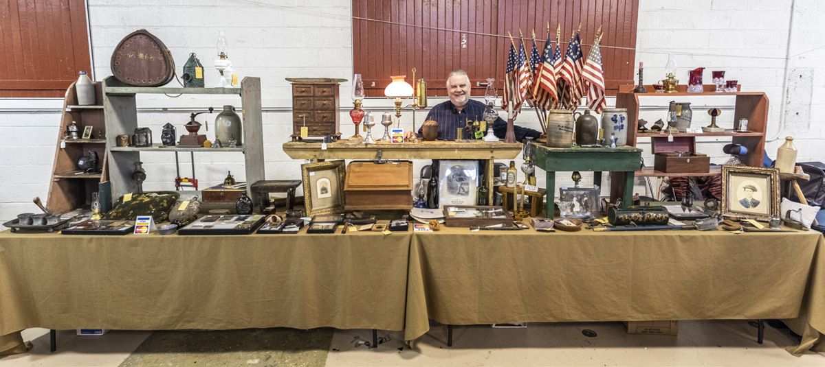 Jerry Lynch with a great assortment of early Americana for sale.