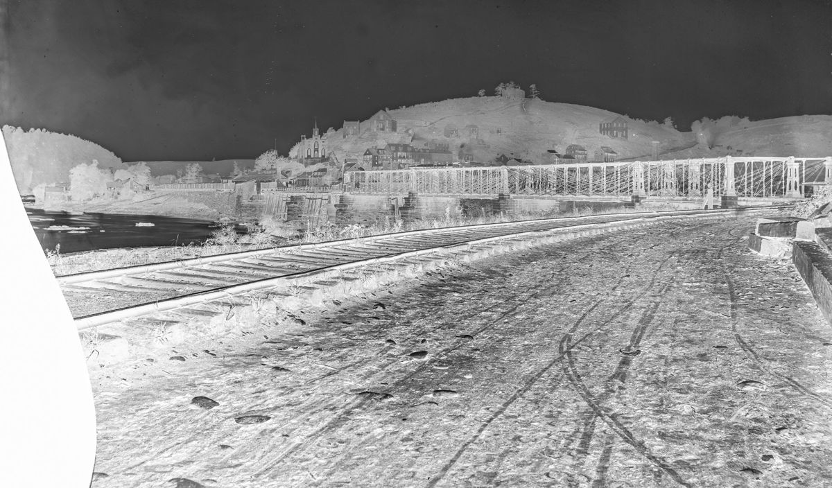 Wartime View of Harpers Ferry and the railroad bridge over the Potomac River.