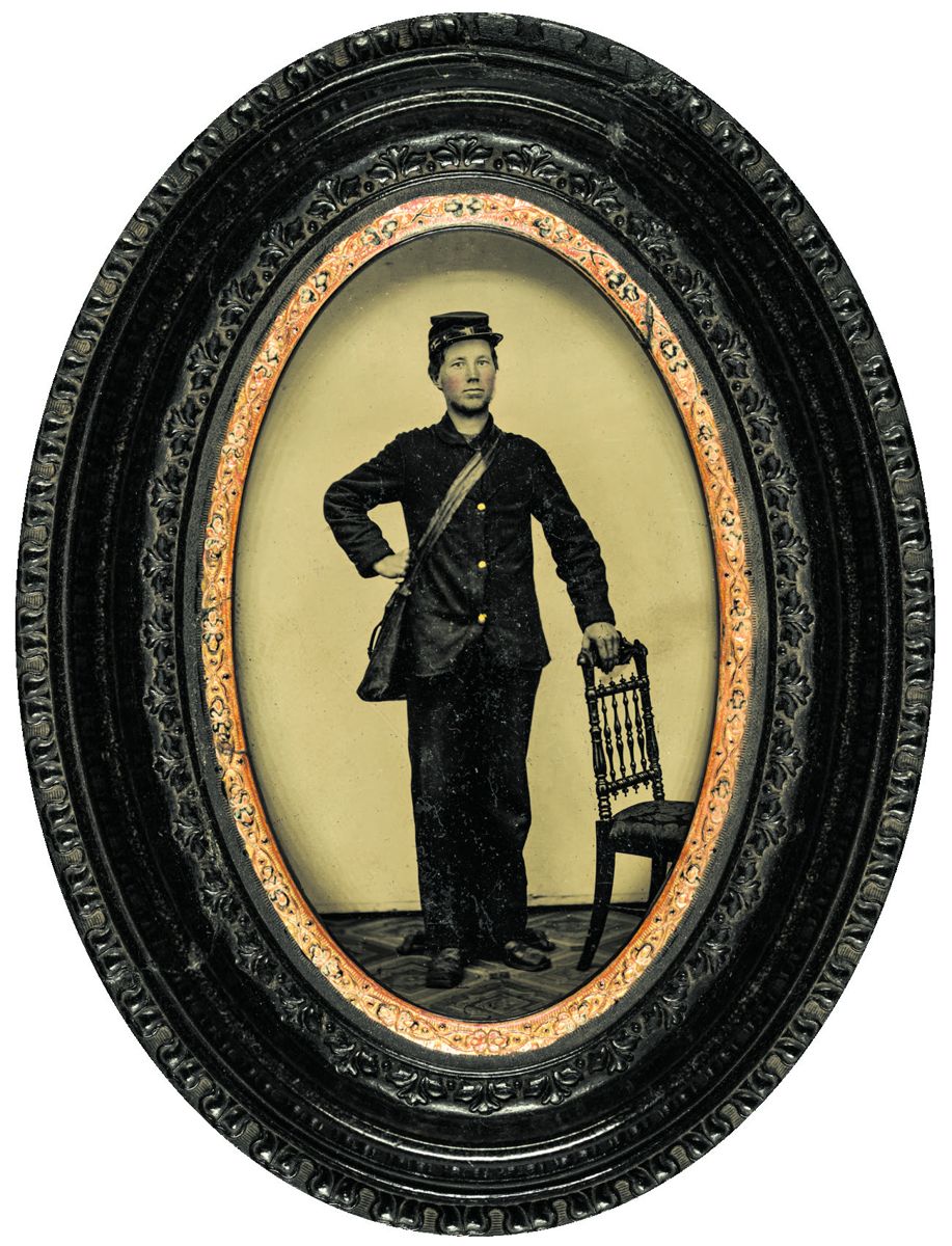 Unidentified young soldier in Union courier uniform and forage cap with haversack. (Library of Congress)