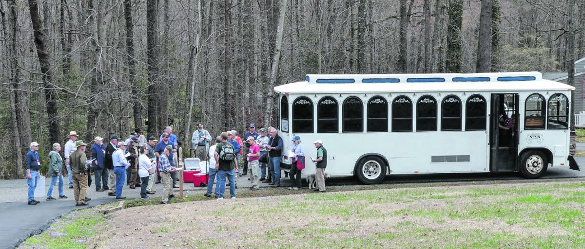 Guests board one of the two trolleys used for transporting tour