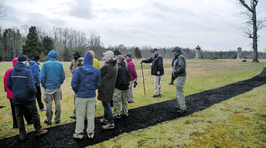 Tour group braves the weather at Spotsylvania’s Bloody Angle.