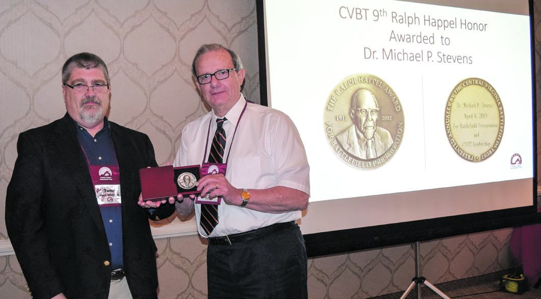 Presentation of Ralph Happel Award from CVBT president Tom Van Winkle to Dr. Michael P. Stevens.