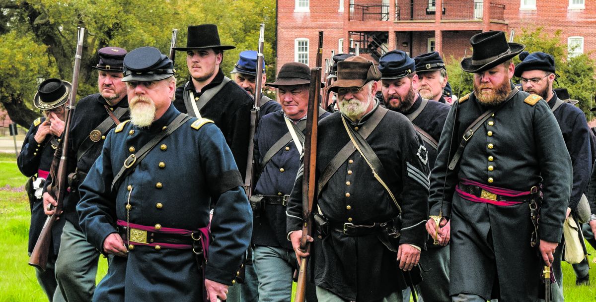 Reenactors drill in the footsteps of untold numbers of American soldiers who have marched on this parade ground over the last 19 decades.