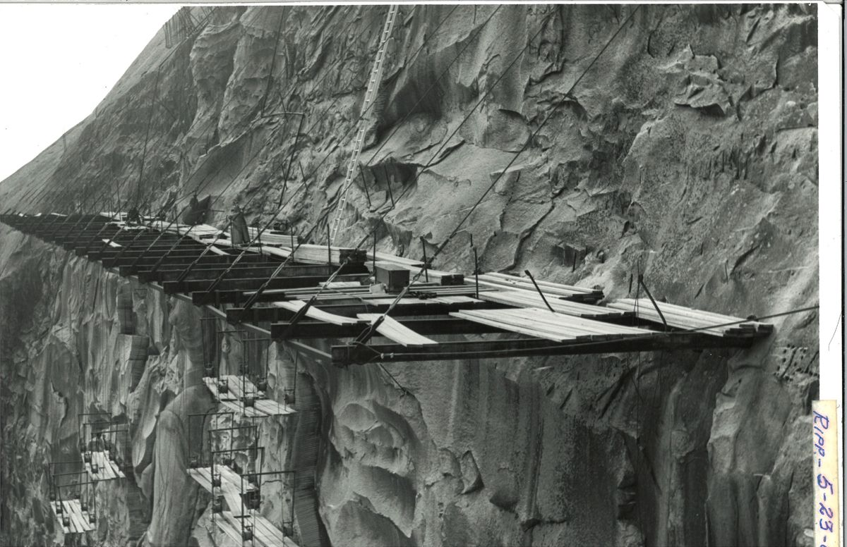 A precarious work station high above the ground. Note the size of the platform compared to the ladder.