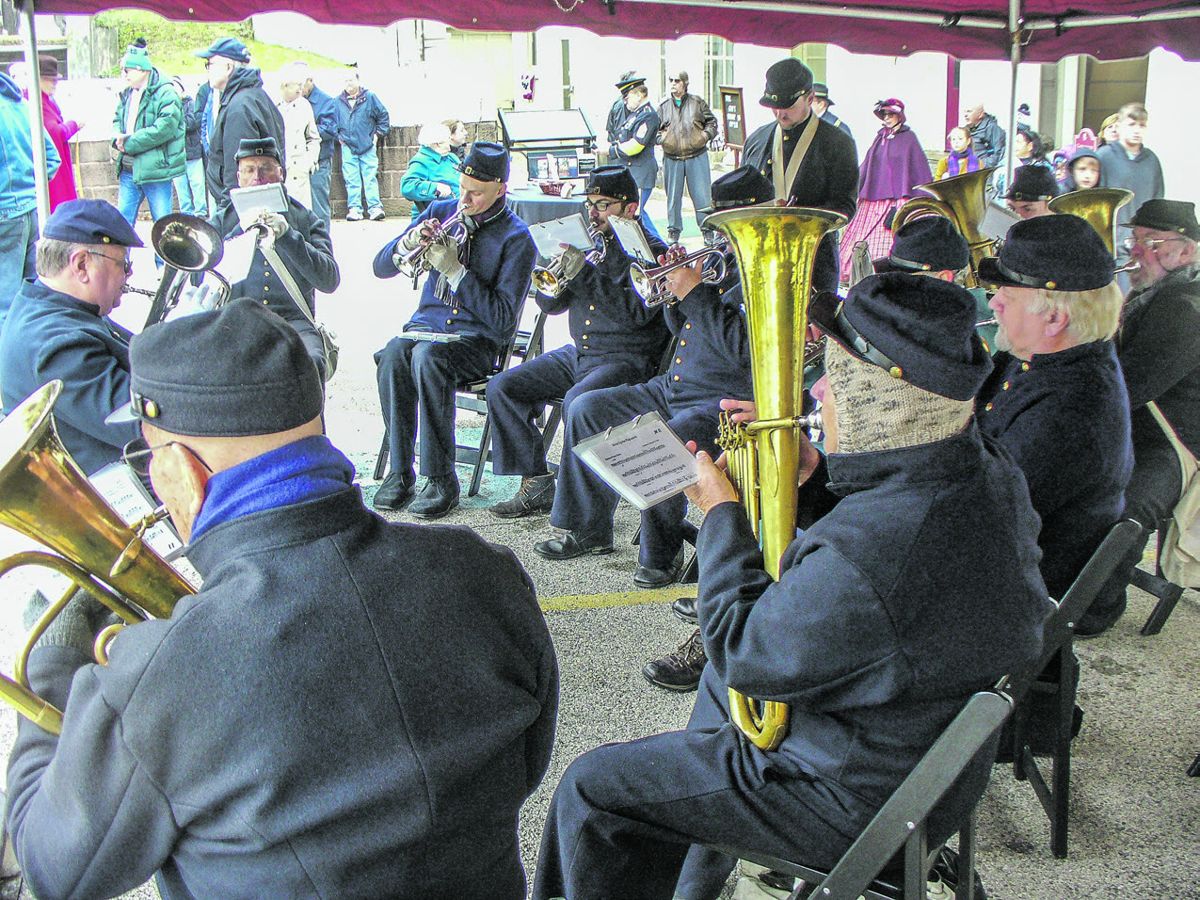 Beck’s Philadelphia Brigade Band braved the cold to greet the birthday celebrants.
