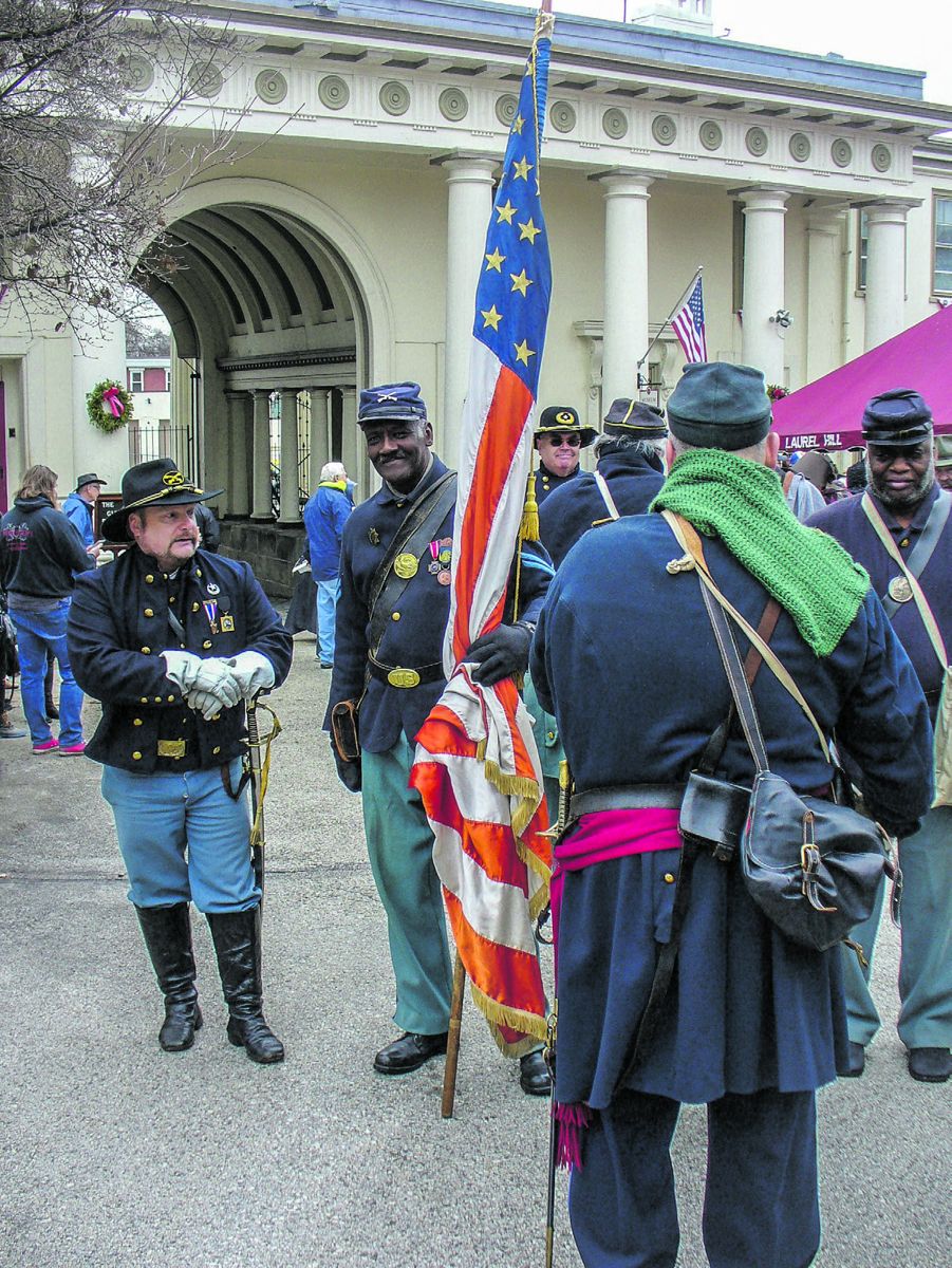 Seen here holding the National Colors is Albert El. Mr. El’s wife’s great-great grandfather served in the Civil War.