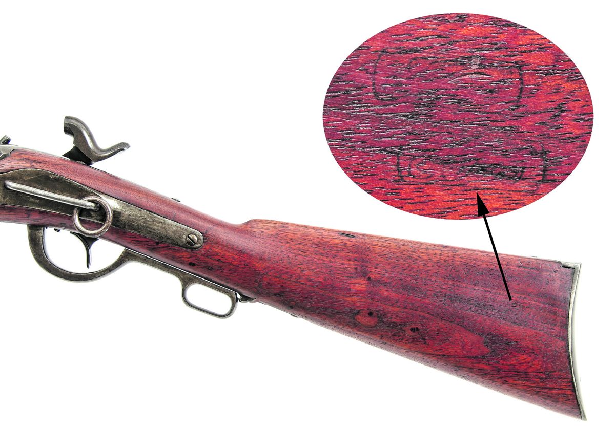Reverse butt of the Gibbs carbine, showing the non-standard location of the inspection cartouches, one of which appears to be Samuel T. Bugbee’s “STB”, the other is not legible.