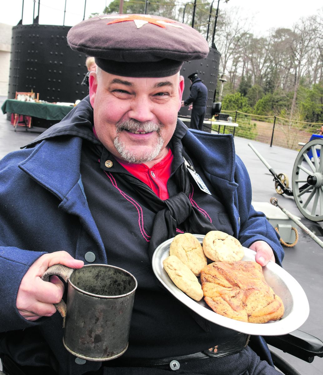 Interpreter Eric Jeanneret offered visitors a look at U.S. Navy chow during the Civil War. A sailor’s fare featured three prime delicacies - sea biscuit, salt pork, and beans. (Bob Ruegsegger)