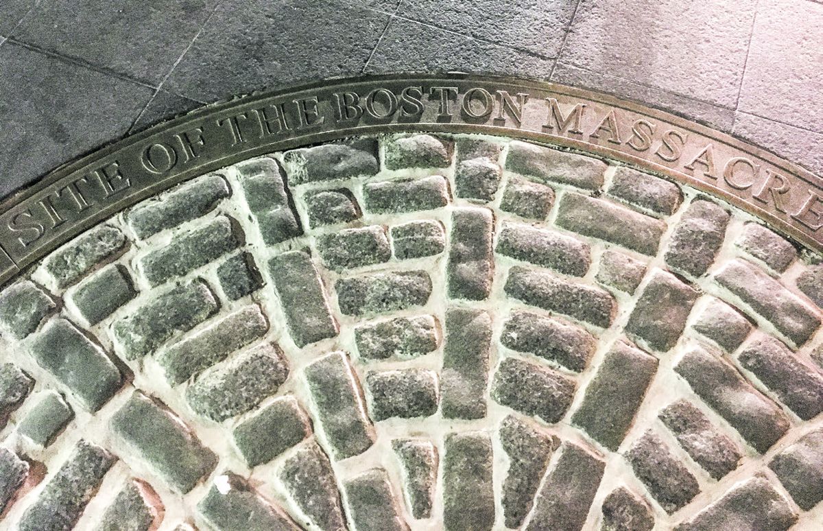 *Picture, taken at night, showing the pavement where the Boston Massacre occurred March 5, 1770.* historic buildings, battlefields, and artifacts as invaluable pieces of the past that tell a story.