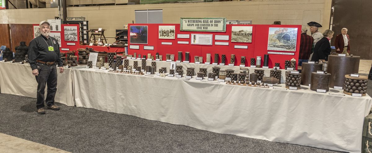 David Gotter stands in front of his Best of Show display, “A Withering Hail of Iron – Grape and Canister in the Civil War.”