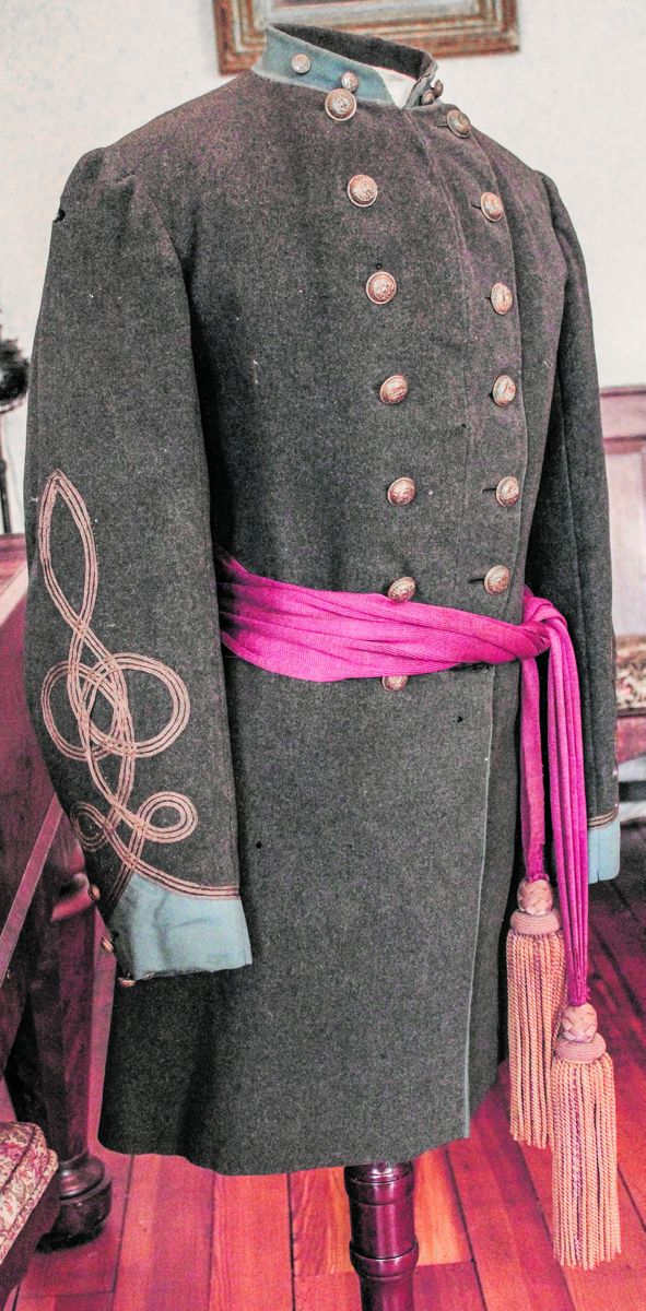 Lt. Colonel George A. Martin's frock coat has CS regulation infantry blue facings and sleeve braid.