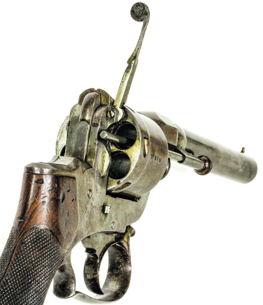 The “Type I” loading gate open and the ejector rod deployed to expel empty shell casings.