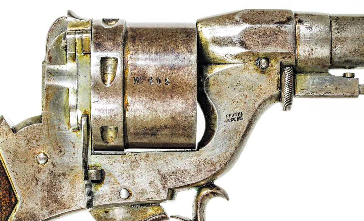 Close up showing the serial number on the cylinder and the Perrin patent mark on the frame