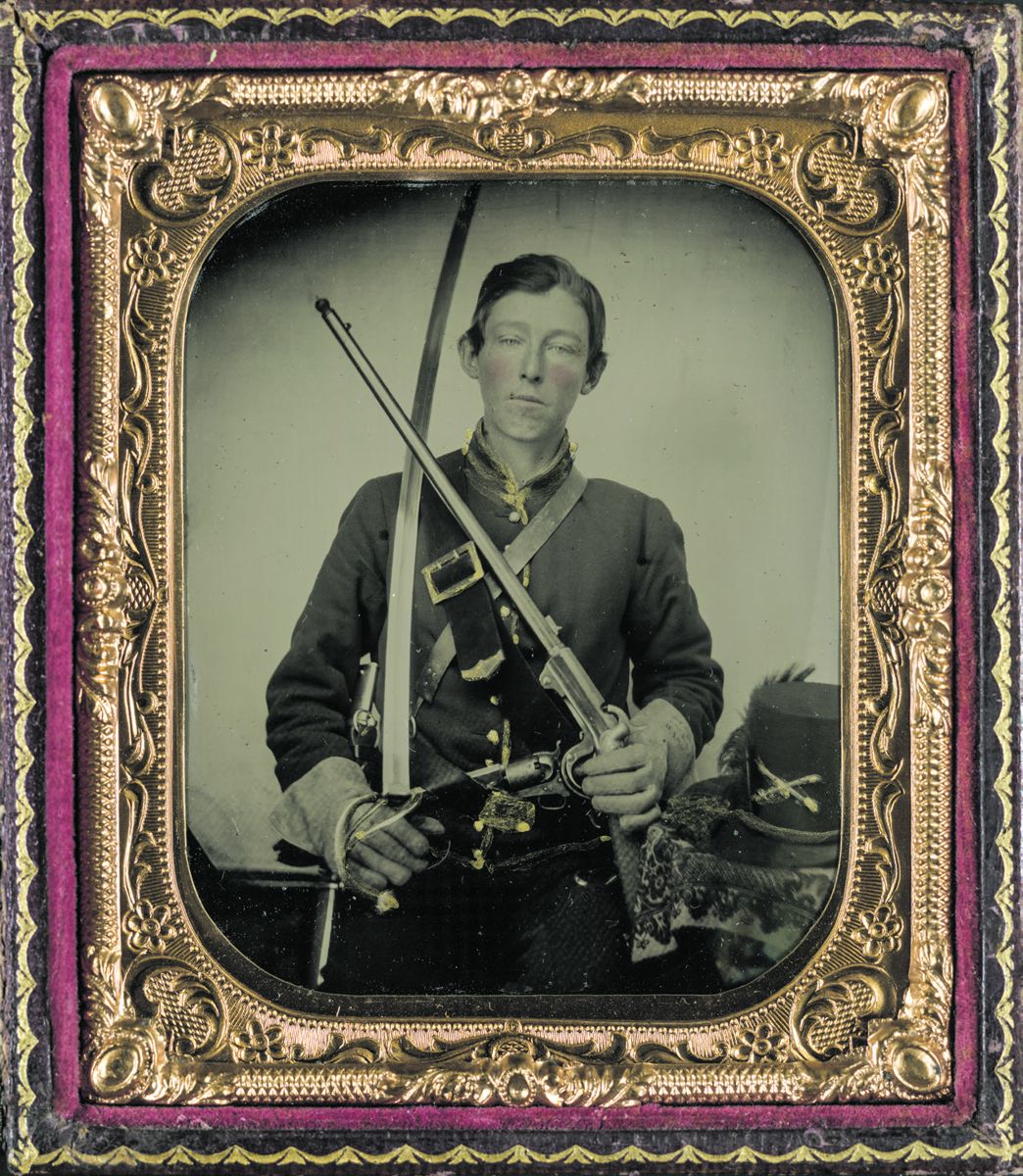 Unidentified soldier in Union uniform with Burnside carbine, revolver, and sword. (Liljenquist Family Collection of Civil War Photographs, Library of Congress)