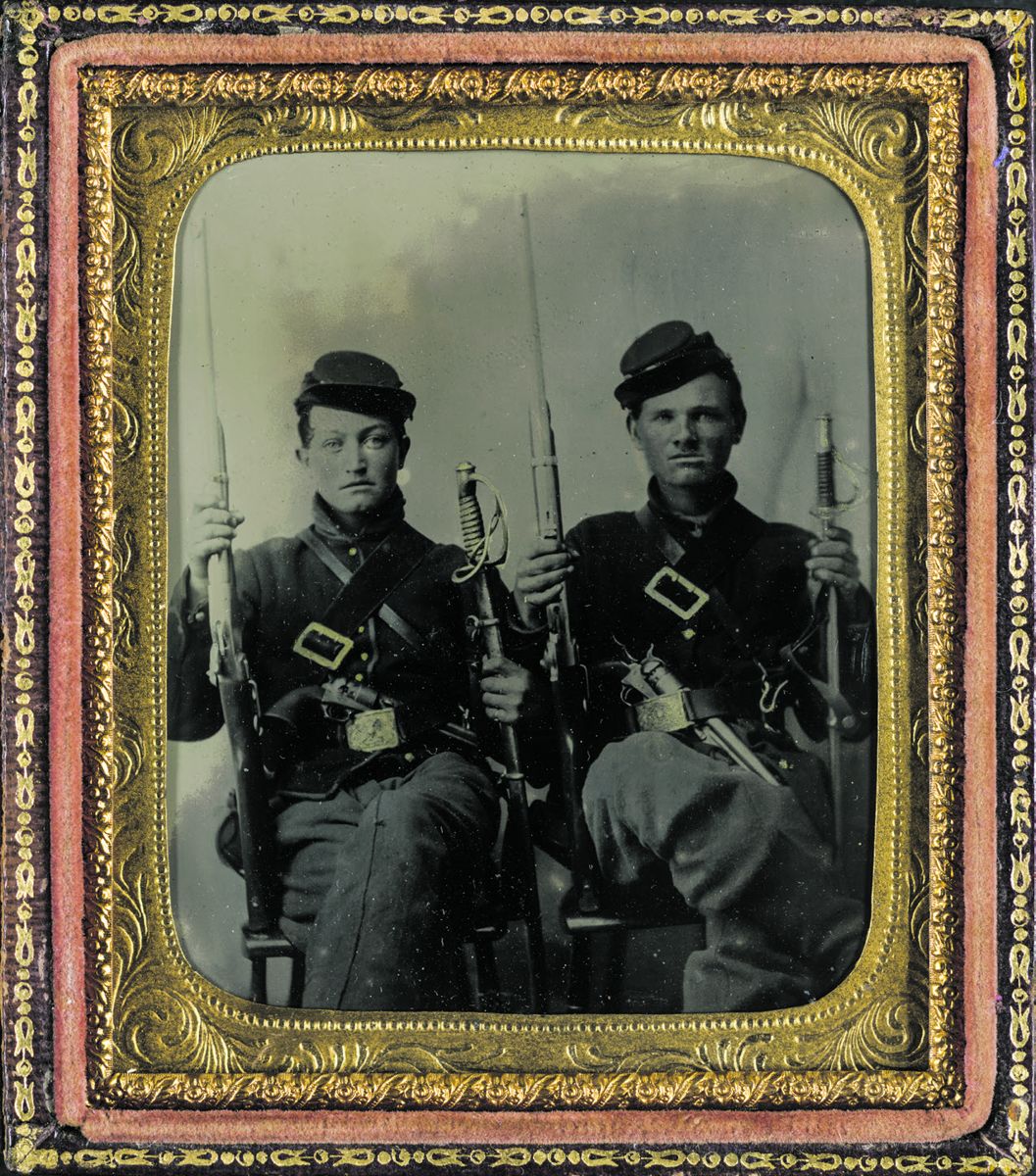 Two unidentified soldiers with Spencer carbines, 1860 sabers, and Colt Army revolvers, probably Union uniforms. (Liljenquist Family Collection of Civil War Photographs, Library of Congress)