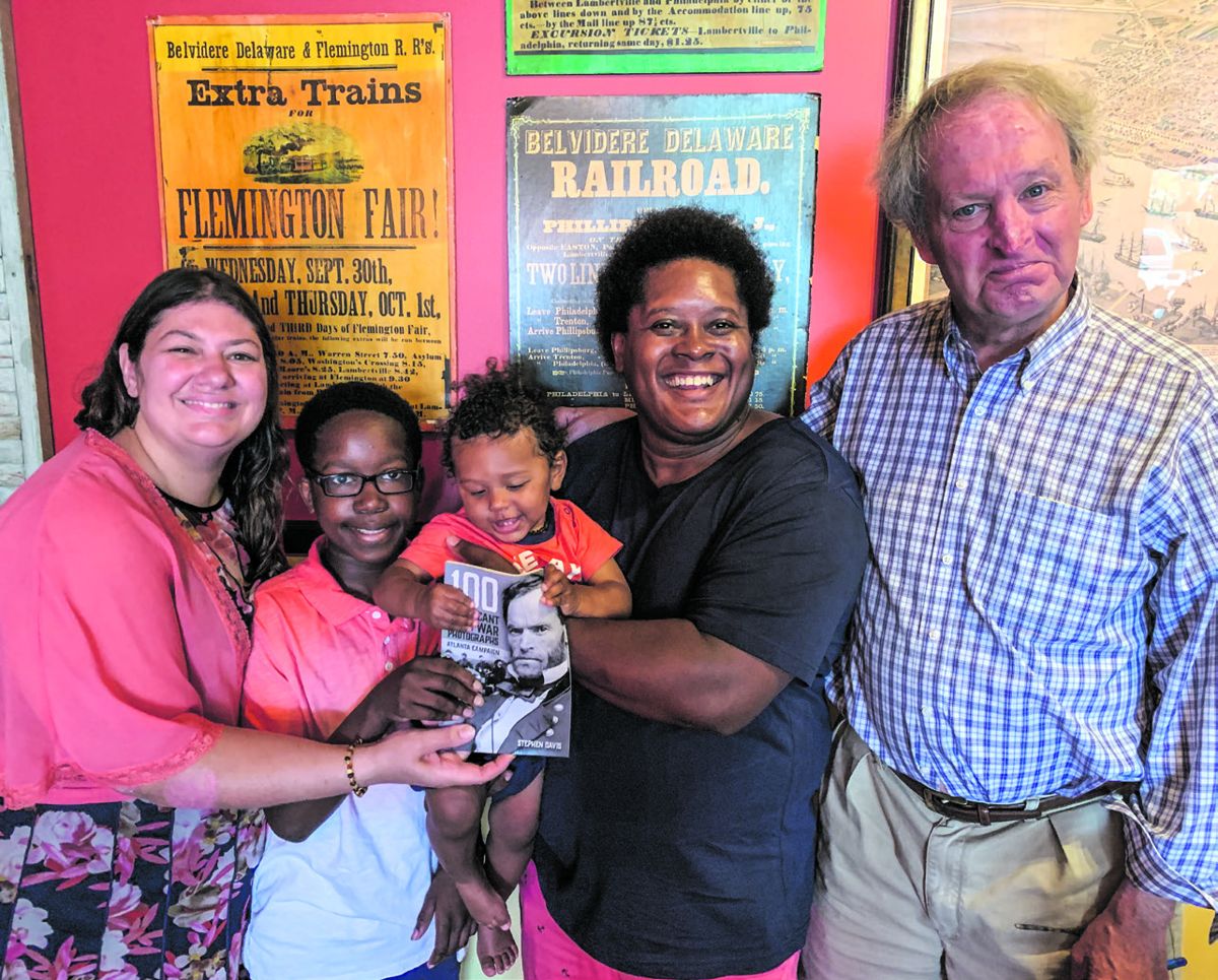 Left to right: Renee, Harrison, infant-in-arms, Wynston, Dwan and author Stephen Davis.