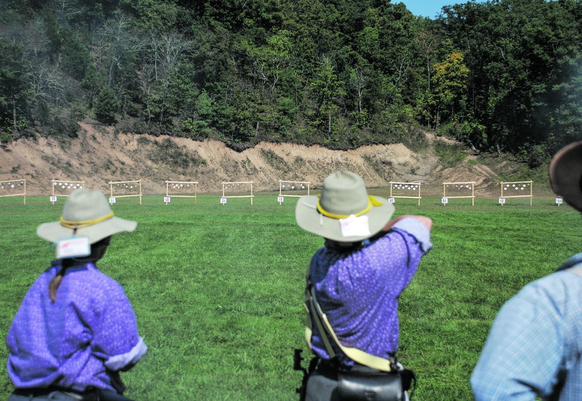 View from firing line as 3rd NC breaks hanging tiles. Blur in distance is a tile shattering.
