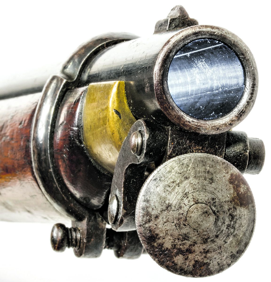 Muzzle area of a P1856 cavalry carbine showing the three- groove rifling and large palm disc of the captive ramrod.