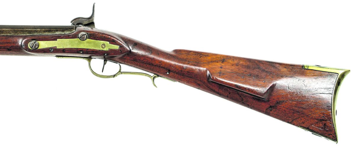 Close up of the lock area of a Merrill-altered Virginia Manufactory 2nd Model rifle, showing the distinctive Merrill bolster and hammer.