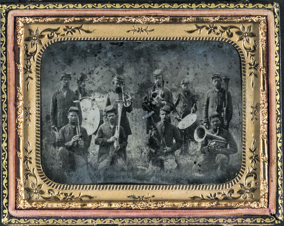 Ten unidentified soldiers that form a Union regimental band with saxhorns and drums.