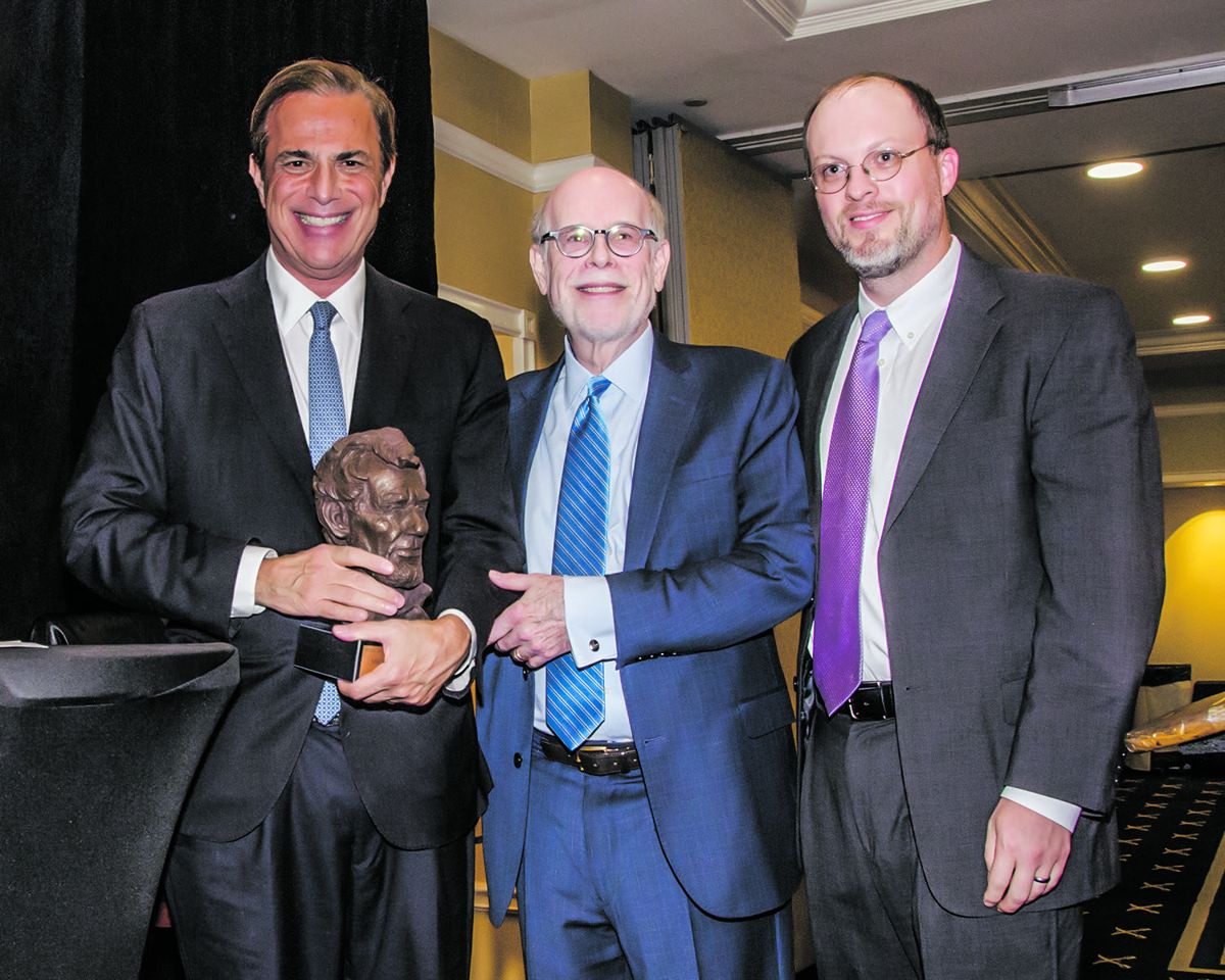Michael Beschloss (L) with the 2019 Lincoln Forum Richard N. Current Achievement Award, presented by Chairman Harold Holzer (C) and Vice Chairman Jonathan W. White.