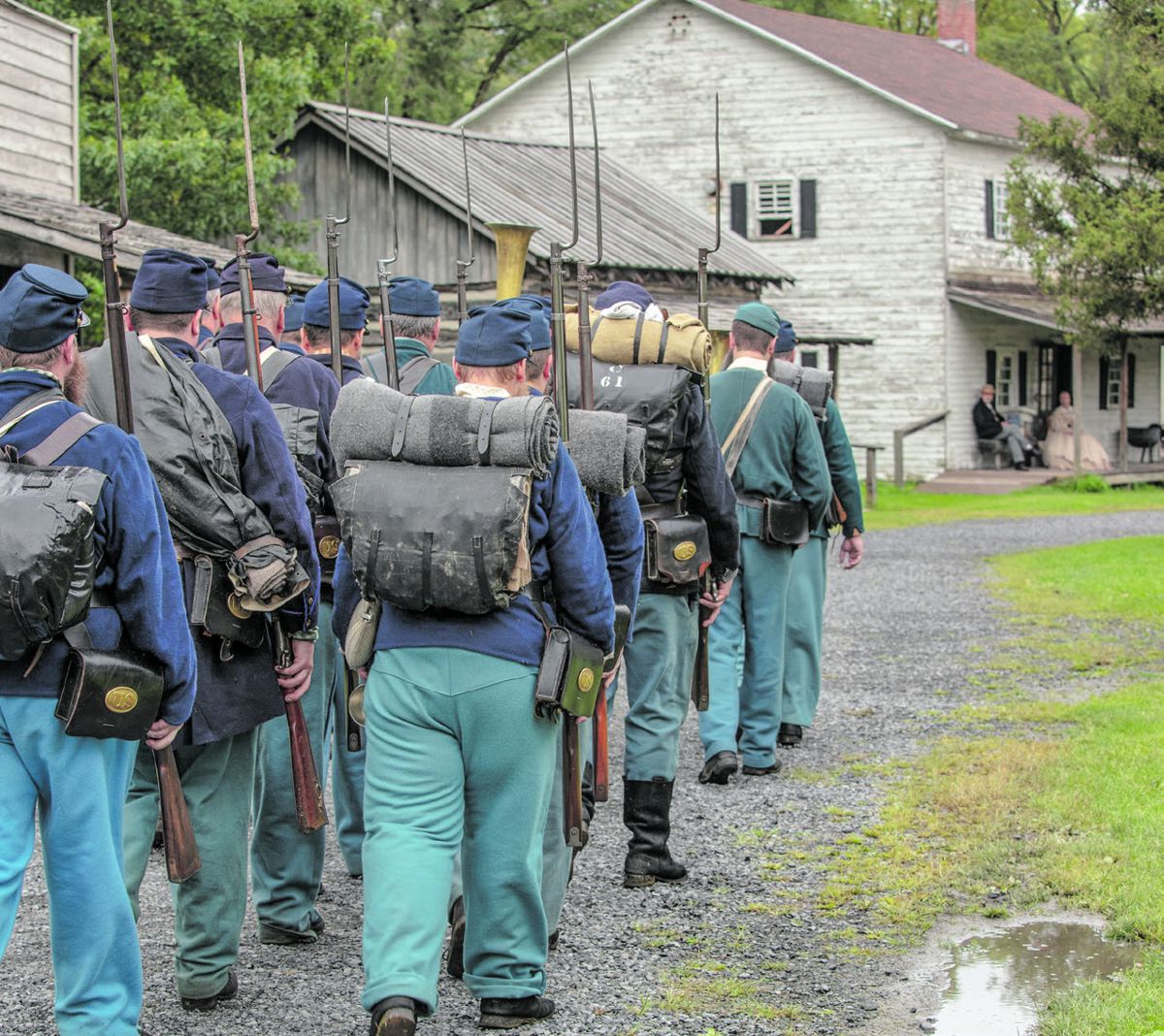 Union soldiers marching through town.
