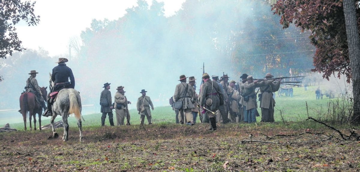 Confederate troops fire back at the Union position.
