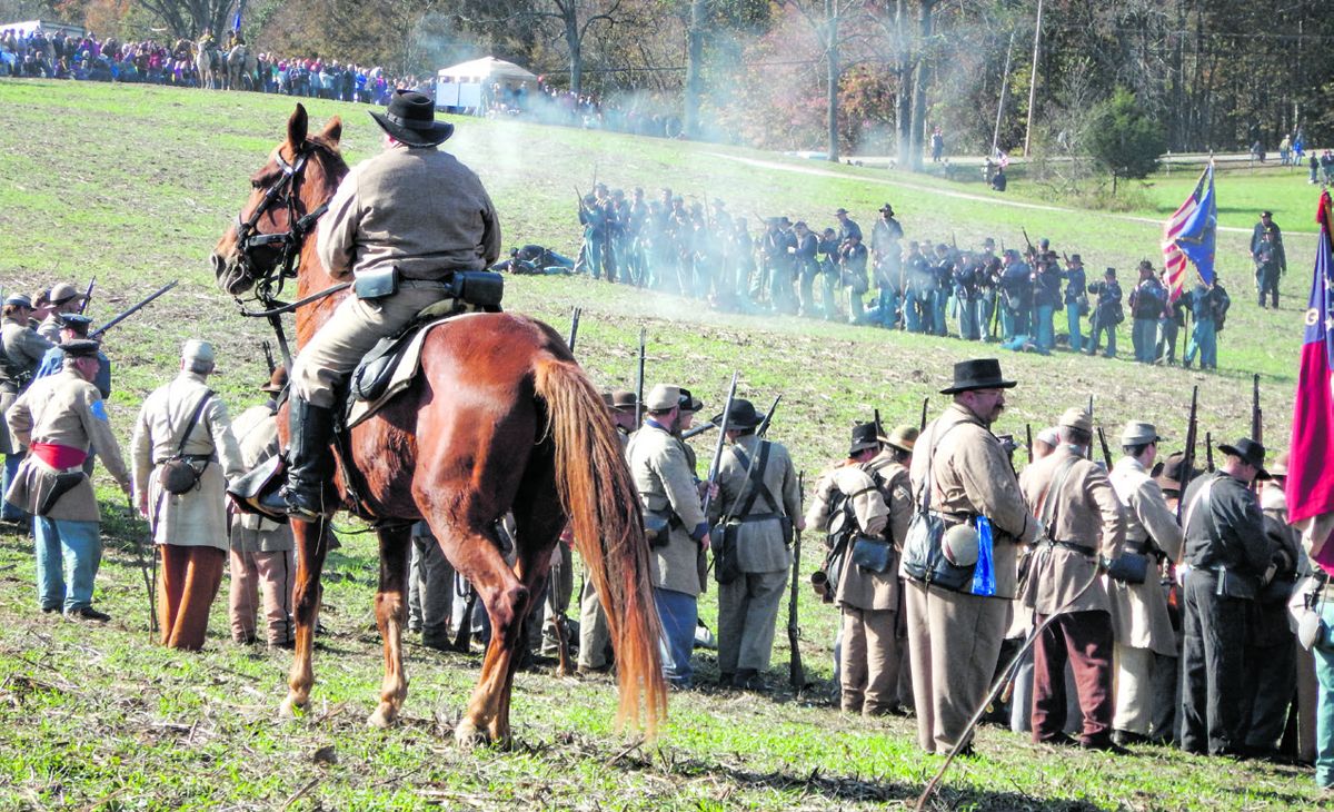 First day of the reenactment with spectators in the background.