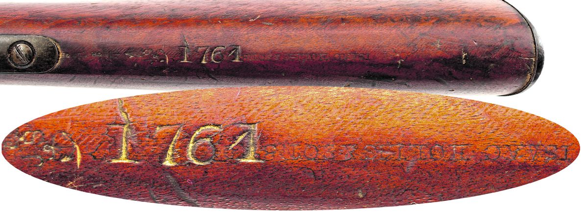 Close up of the markings in the belly of the stock of iron mounted Bar on Band rifle #1761. Note that the J S / {ANCHOR} Confederate viewer’s mark and the fact that the inventory number is partially stamped over the contractor name of Isaac Hollis & Sons, the maker of the rifle.