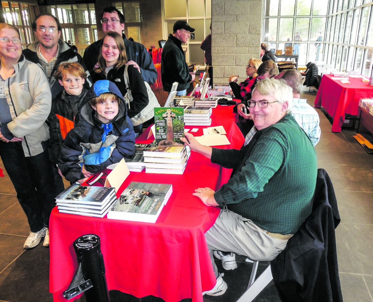 The Boone family from Iowa, at the NPS Visitor Center and bookstore.