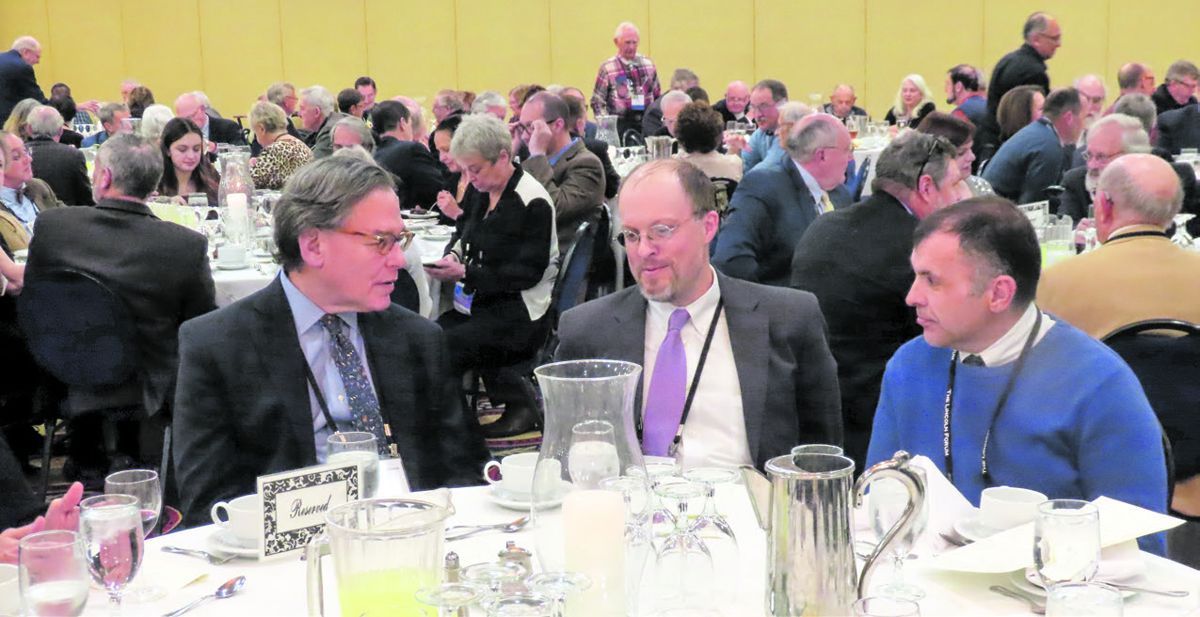 Award winner Sidney Blumenthal speaks with panelists Jonathan White (center) and Brian Dirck (right).