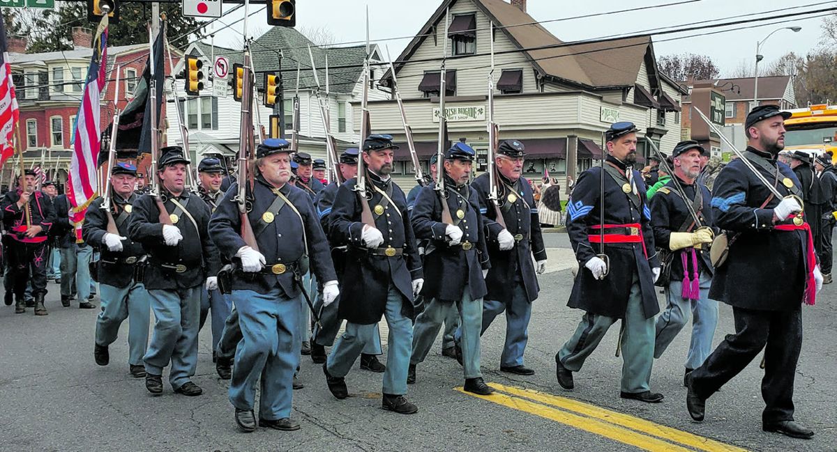 Members of the Mifflin Guard march down Baltimore Street.
