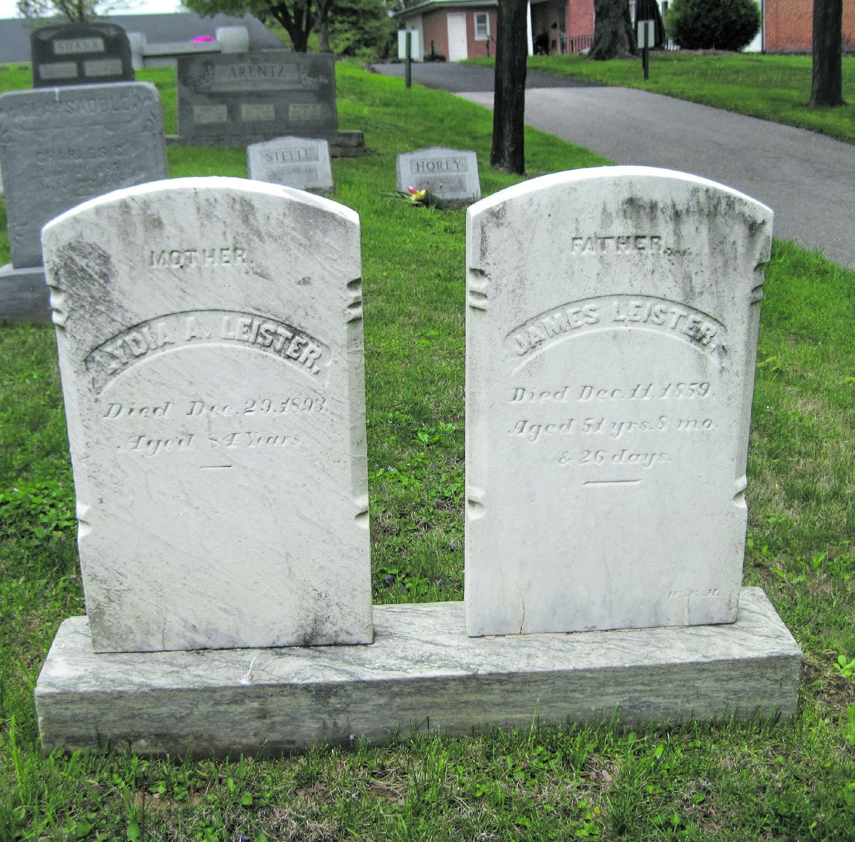 Lydia A. and James Leister’s headstones in Evergreen Cemetery.