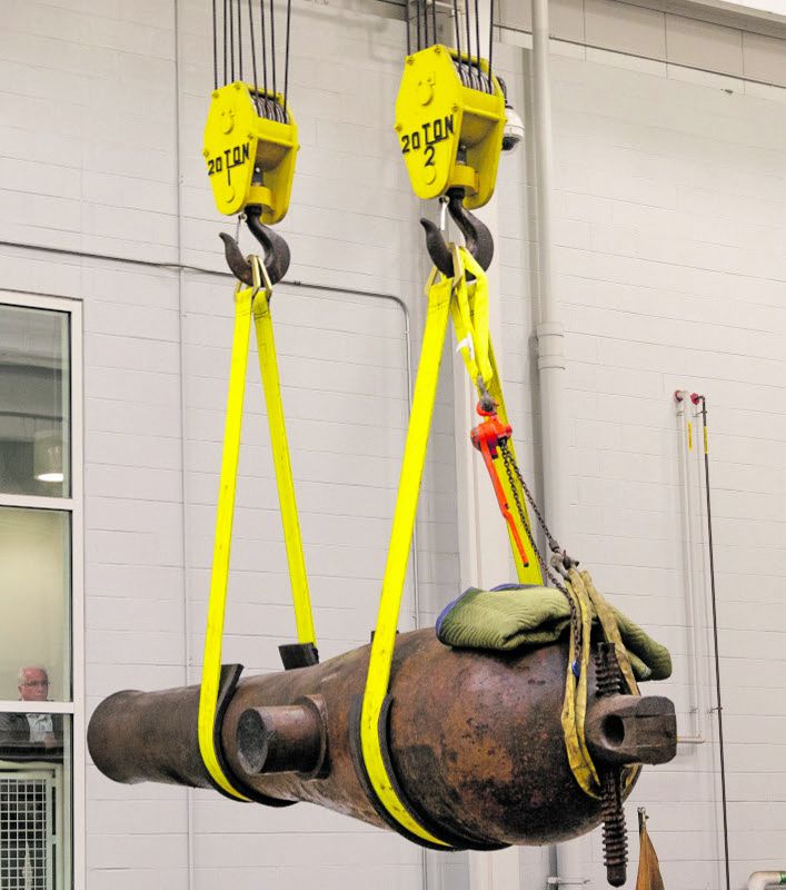 Dahlgren shell gun lifted out of its tank. Courtesy of Brock Switzer/The Mariners’ Museum and Park.