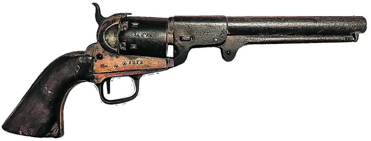 This revolver has a rich dark mustard patina to the brass and iron is dark with pitting. The revolver appears all original, matching, and complete with exception of the missing loading assembly plunger. There are chips in grips and an unknown small silver inset.