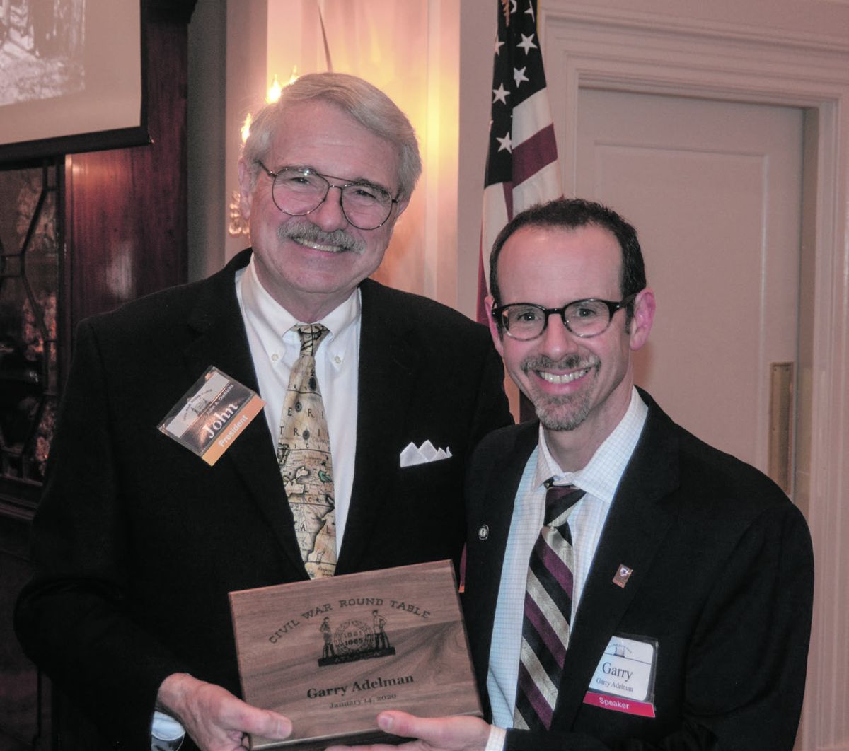 John Dietrichs, Atlanta Civil War Round Table President, presents Garry Adelman with a personalized wooden box with the round table’s logo.