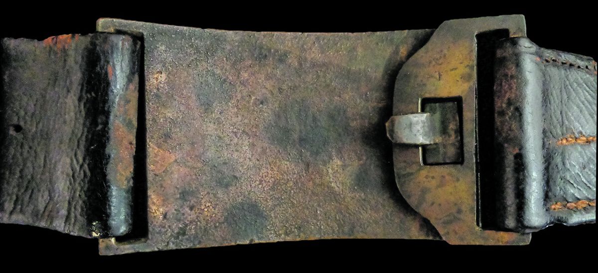 The solder filed down the keeper to give the buckle a little bit of