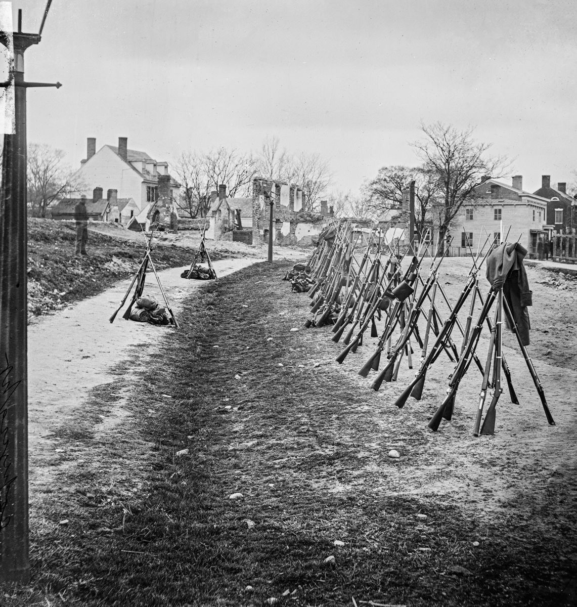 Stacked U.S. .58 caliber rifle muskets outside Petersburg ca 1864-65, showing M1861s, as well as some M1861 Special Models and M1863 Rifle Muskets. (Library of Congress)