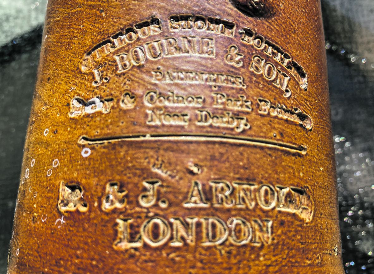 Inscription on an ink bottle recovered from the wreck. (Bill