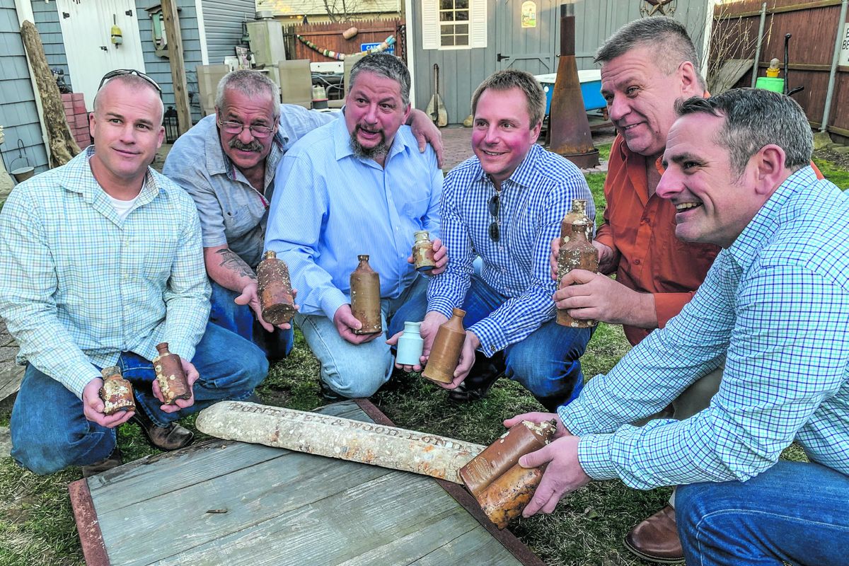 The divers, left to right: John Noonan, Patrick Rooney, Andrew Favata, Ben Roberts, John Bricker, and Jim DiSciullo, with some artifacts. (Bill Bleyer)